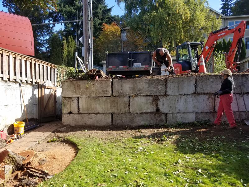 Retaining Walls, Parking Pad, Drain System.