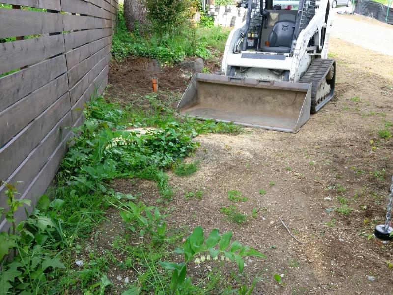  Retaining Walls, Regrading, Sod & Fence Installation.