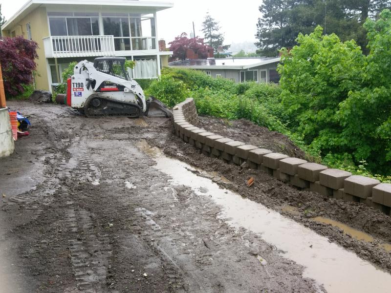  Retaining Walls, Regrading, Sod & Fence Installation.