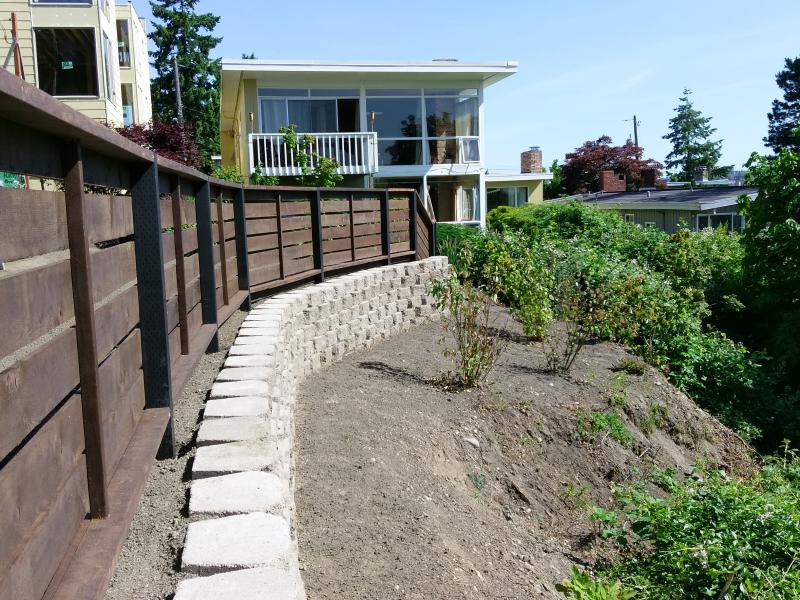  Retaining Walls, Regrading, Sod & Fence Installation.