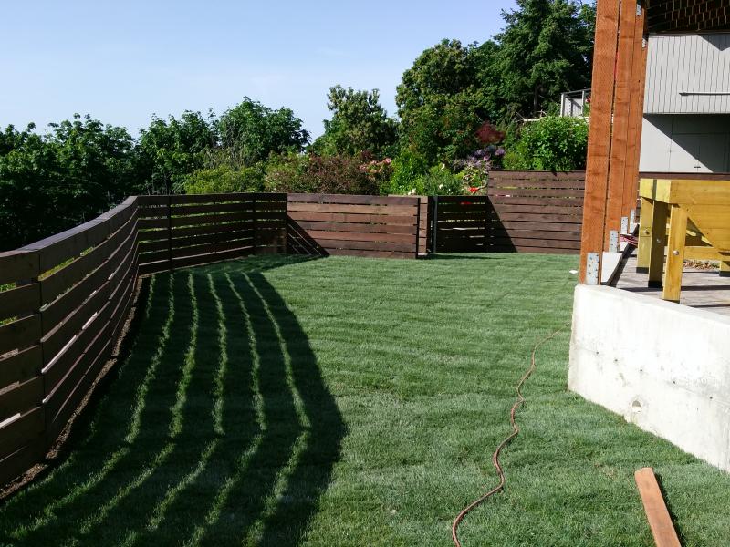  Retaining Walls, Regrading, Sod & Fence Installation.